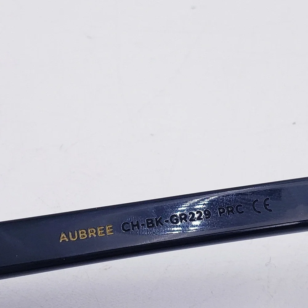 DIFF Eyewear Aubree Sunglasses Black Gold Round Cat Eye Metal Bridge